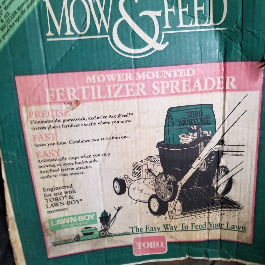"Mow and Feed " Mower mounted fertalizer feeder OEM Lawn Boy